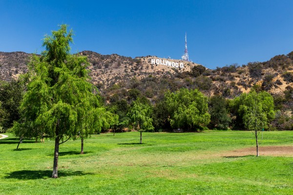 HOLLYWOOD, LOS ANGELES - SEPTEMBER 11: Views of the Lake Hollywood Park and the Hollywood sign in the background on September 11, 2015. The Park is popular by tourist for taking pictures of the sign.